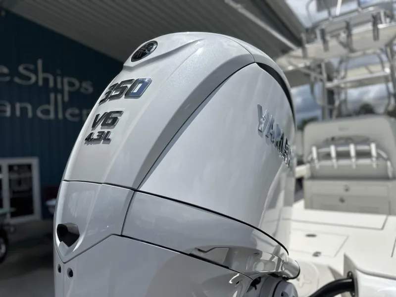 Slide: The Image of 2025 Pathfinder 2600 TRS with Yamaha V6 4.2L outboard engine, close-up view. - 9