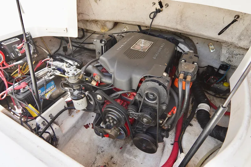 Slide: The Image of 2003 Chaparral 225 SSi engine compartment with visible wiring and components. - 18