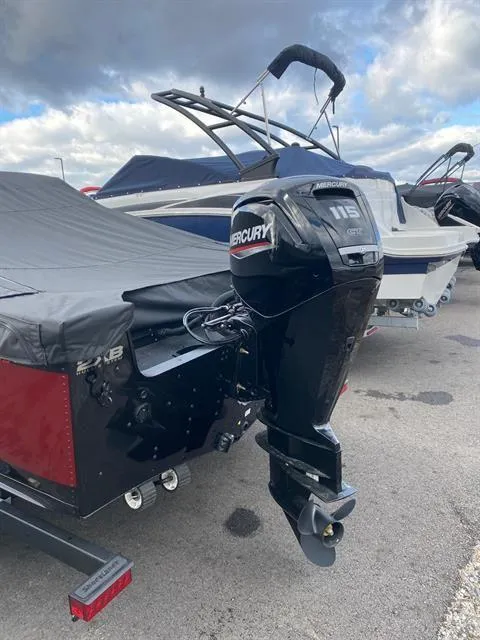 Slide: The Image of 2022 Alumacraft Trophy 185 boat with Mercury 115 outboard motor, parked on a lot. - 13