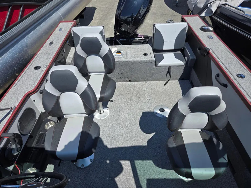 Slide: The Image of 2022 Alumacraft Trophy 185 boat interior with four seats and modern design. - 8