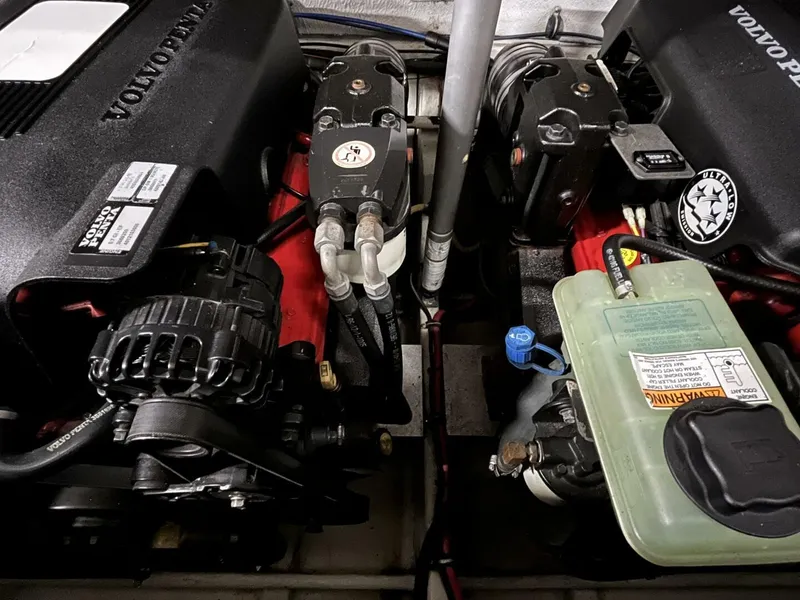 Slide: The Image of Engine compartment of a 2005 Chris-Craft Corsair 28 with Volvo Penta components. - 31