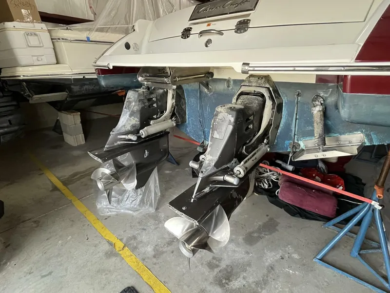 Slide: The Image of 2005 Chris-Craft Corsair 28 boat with dual propellers in a storage area. - 39