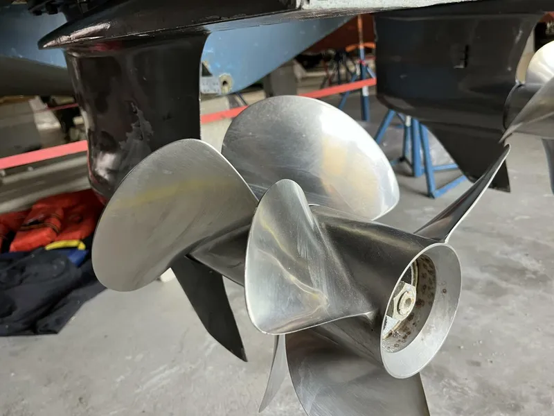 Slide: The Image of Propeller of a 2005 Chris-Craft Corsair 28 boat in a workshop setting. - 41