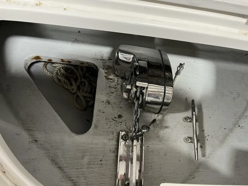 Slide: The Image of Anchor chain and winch on 2005 Chris-Craft Corsair 28 boat deck. - 46