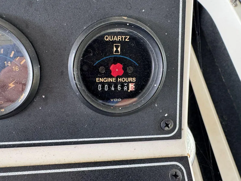 Slide: The Image of 1994 Carver 350 Aft Cabin engine hour meter showing 468 hours. - 15