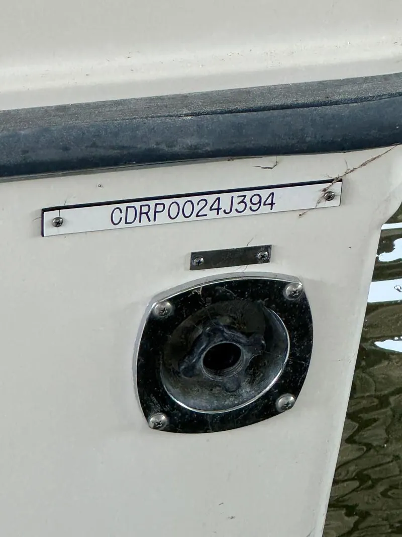 Slide: The Image of 1994 Carver 350 Aft Cabin boat with visible hull identification number. - 38