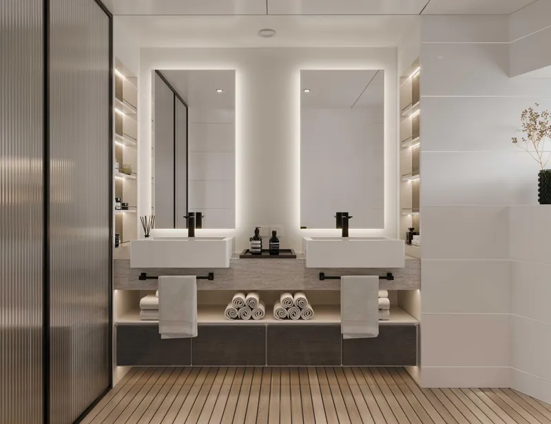 Slide: The Image of Modern bathroom with dual sinks, illuminated mirrors, and sleek shelving in a 2027 Tufan and Brothers Mako Shark. - 14