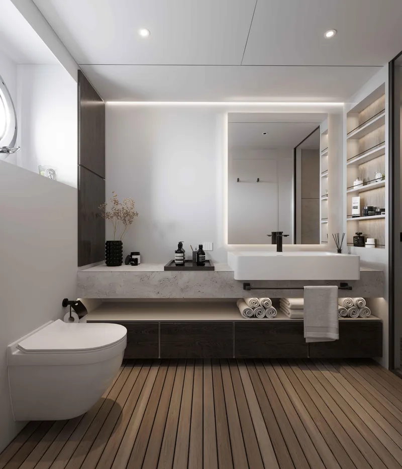 Slide: The Image of Modern bathroom with sleek fixtures, wooden flooring, and illuminated mirror in a 2027 Tufan and Brothers Mako Shark. - 23