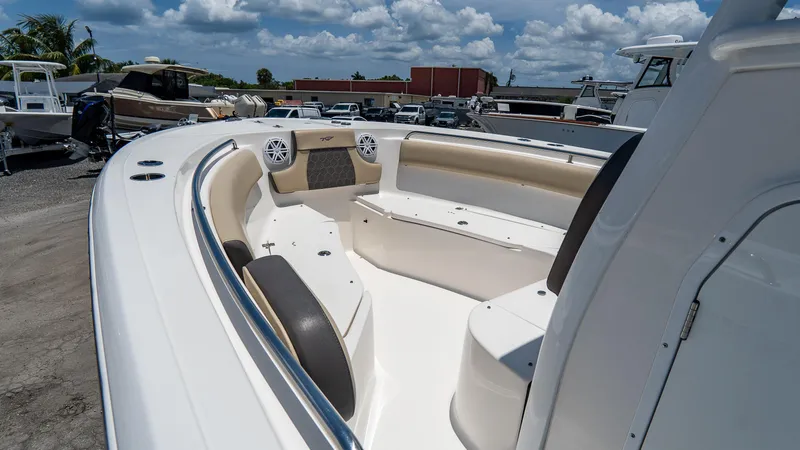 Slide: The Image of 2020 Tidewater 232 LXF boat interior with spacious seating and modern design. - 16