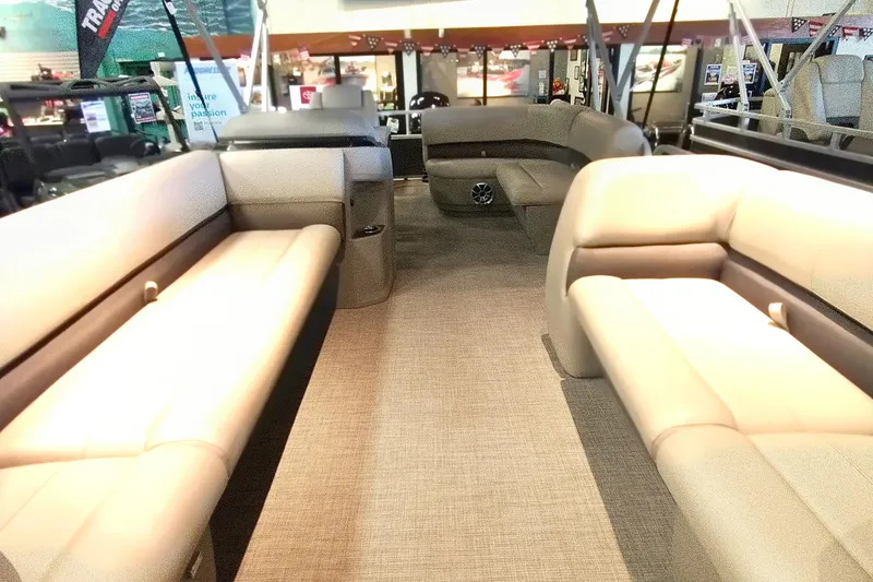 Slide: The Image of 2025 Sun Tracker Party Barge 18 DLX interior with spacious seating and modern design. - 16