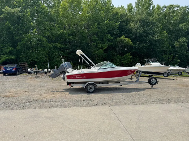 Slide: The Image of 2009 Pioneer 175 Venture boat with Yamaha engine on trailer. - 1