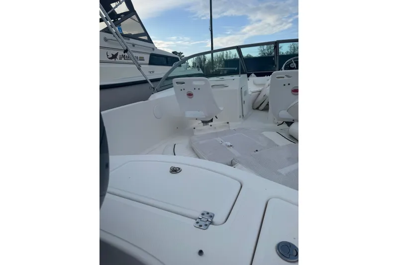 Slide: The Image of 2009 Pioneer 175 Venture boat interior with seating and open deck. - 11