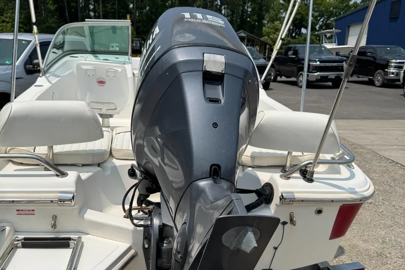 Slide: The Image of 2009 Pioneer 175 Venture boat dashboard with steering wheel and gauges. - 3