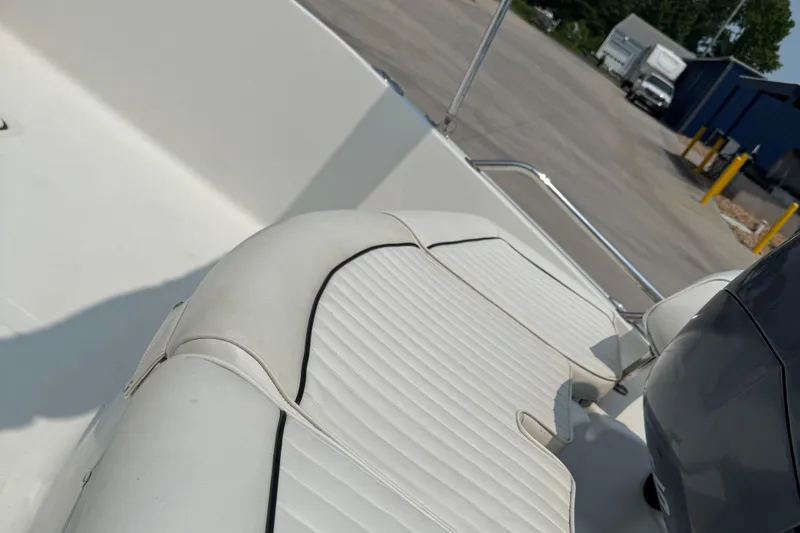 Slide: The Image of Close-up of a 2009 Pioneer 175 Venture boat's metal fittings and hull details. - 7