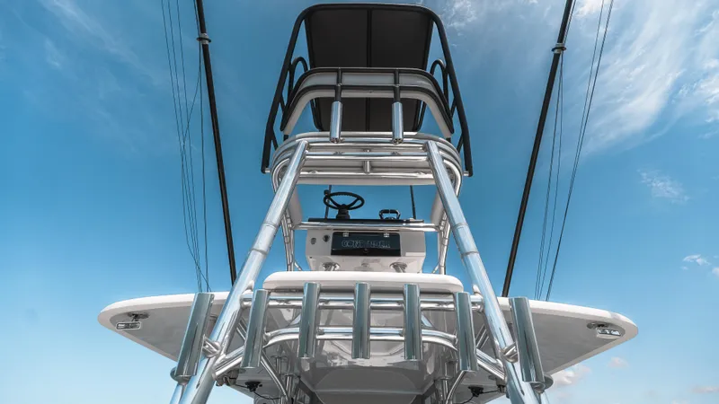 Slide: The Image of 2023 Contender 39 ST boat tower against a clear blue sky. - 25
