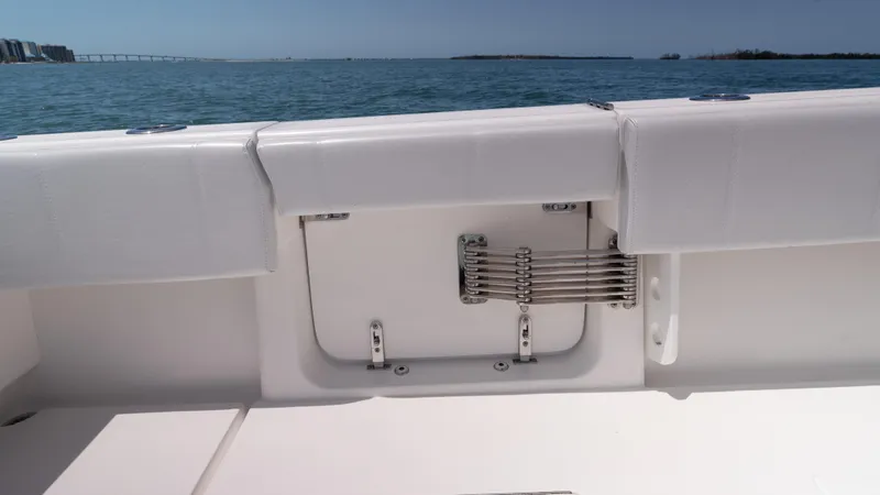 Slide: The Image of 2023 Contender 39 ST boat interior with ocean view and seating area. - 38