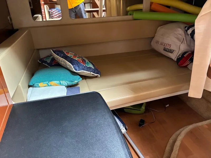 Slide: The Image of Interior cabin of 2009 Sea Ray 330 Sundancer with cushions and life jackets. - 20
