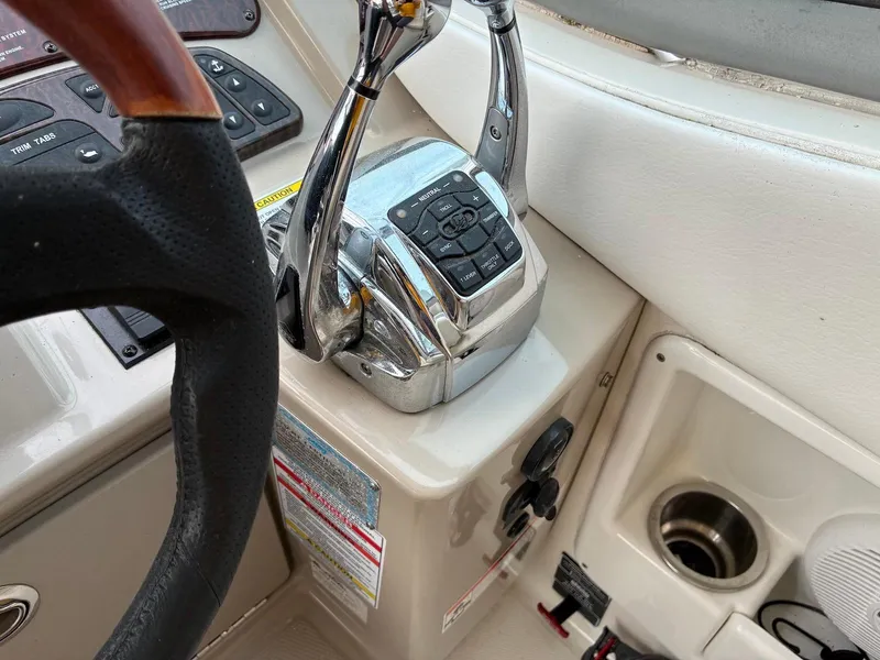 Slide: The Image of Close-up of 2009 Sea Ray 330 Sundancer helm controls and steering wheel. - 5