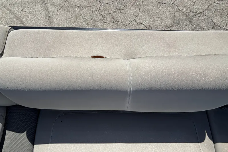 Slide: The Image of 2023 Regency 230 LE3 Sport seat with a small tear on the backrest. - 9
