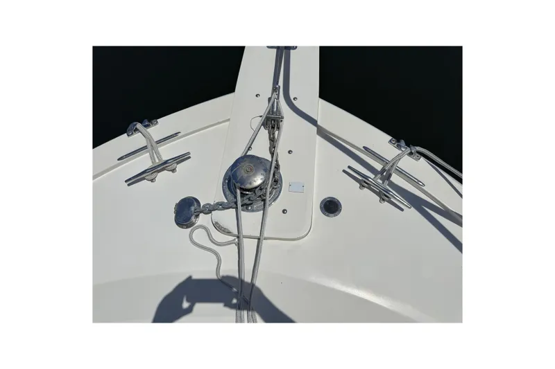 Slide: The Image of Bow of 1990 Viking 35 boat with anchor and cleats. - 22