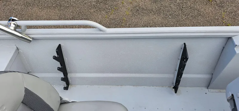 Slide: The Image of 2024 G3 Sportsman 2100 boat interior with seat and rod holders. - 14