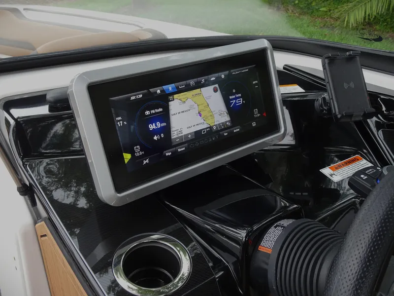 Slide: The Image of 2024 Yamaha Boats 252SE dashboard with advanced navigation display. - 16