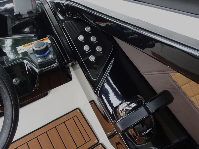 Slide: The Image of Control panel of 2024 Yamaha Boats 252SE with sleek design and modern features. - 17
