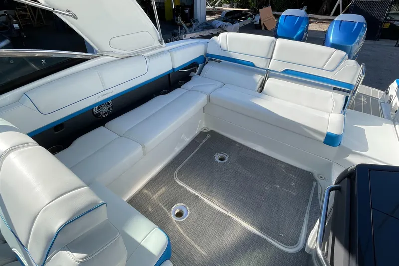 Slide: The Image of 2020 Formula 310 Bowrider interior with spacious white seating and modern design. - 21