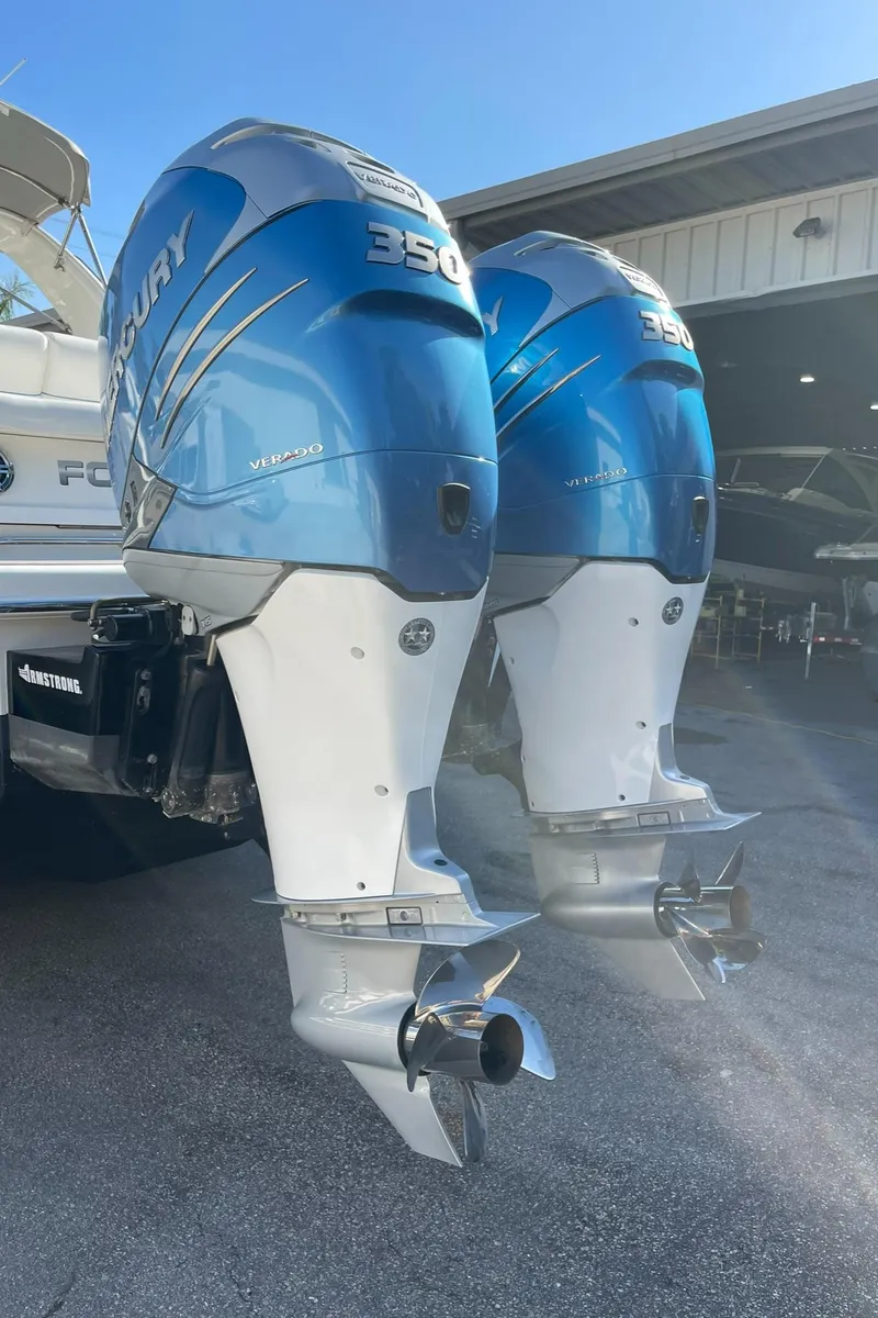 Slide: The Image of 2020 Formula 310 Bowrider with twin Mercury 350 Verado outboard engines. - 22