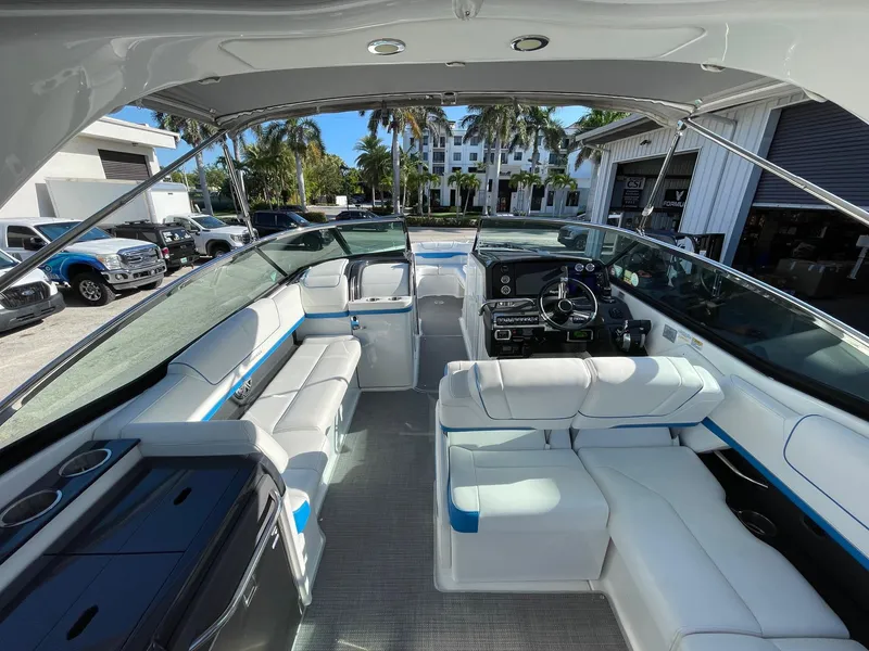 Slide: The Image of 2020 Formula 310 Bowrider interior with luxurious seating and modern dashboard. - 8