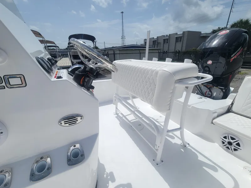Slide: The Image of 2025 Blazer Bay boat interior with steering console and seating, featuring modern design elements. - 11