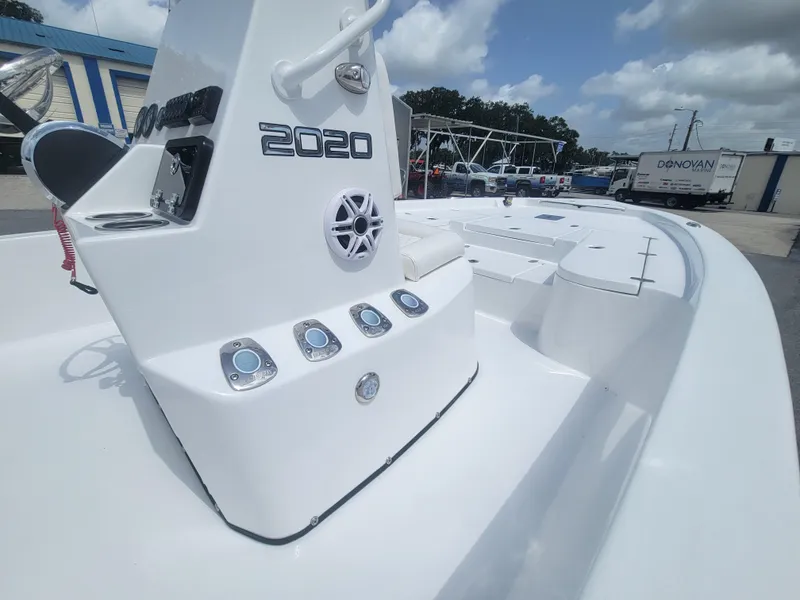 Slide: The Image of Blazer Bay 2020 boat, sleek white design, outdoor setting, clear sky, modern features. - 16