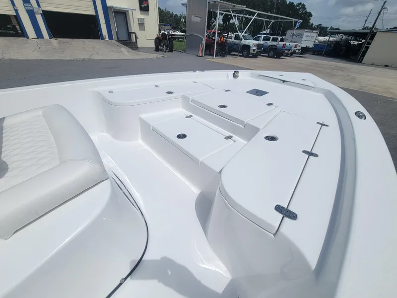 Slide: The Image of 2025 Blazer Bay 2020 boat deck with seating and storage compartments. - 17