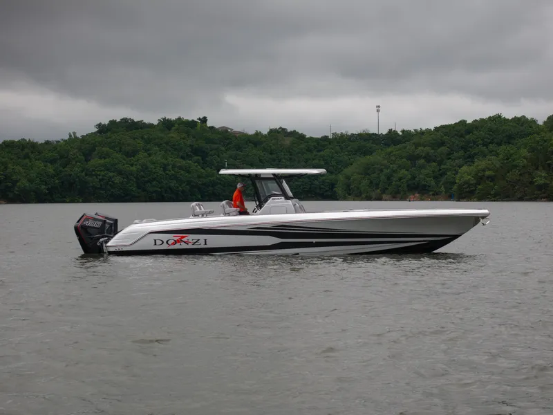 The Image of 2025 Donzi 39 VRZ boat on a lake with overcast skies. - 1