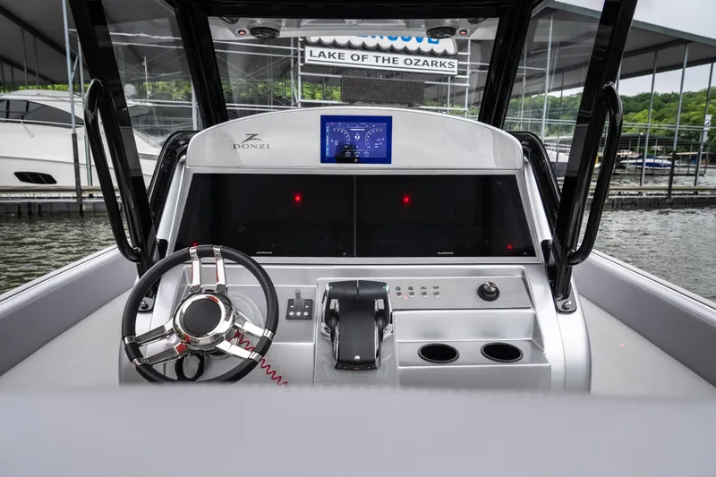 Slide: The Image of 2025 Donzi 39 VRZ boat dashboard at Lake of the Ozarks marina. - 22