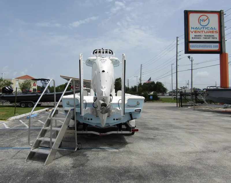 Slide: The Image of 2021 Tidewater 2700 Carolina Bay boat displayed at Nautical Ventures dealership. - 2
