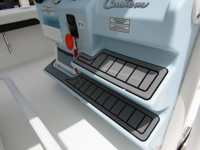 Slide: The Image of 2021 Tidewater 2700 Carolina Bay boat interior with custom non-slip steps. - 29