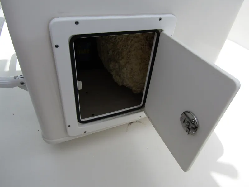 Slide: The Image of Open storage compartment on 2021 Tidewater 2700 Carolina Bay boat. - 35