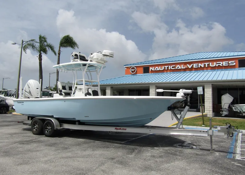Slide: The Image of 2021 Tidewater 2700 Carolina Bay boat on trailer at Nautical Ventures dealership. - 6