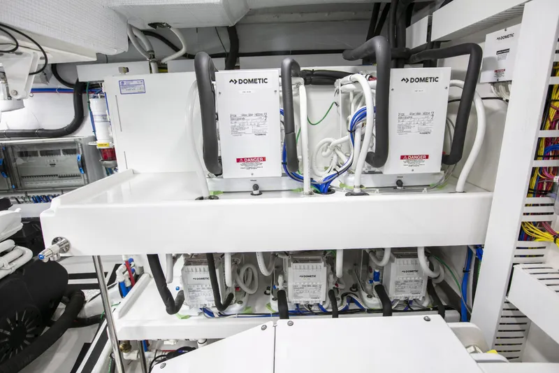 Slide: The Image of Engine room of 2026 Sabre 58 Salon Express with Dometic equipment and wiring. - 28