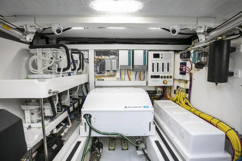 Slide: The Image of Engine room of 2026 Sabre 58 Salon Express with modern equipment and wiring. - 31