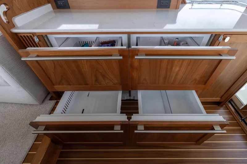 Slide: The Image of Modern kitchen drawers in 2026 Sabre 58 Salon Express yacht interior. - 6
