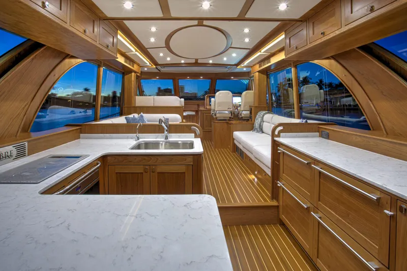 Slide: The Image of Luxurious interior of 2026 Sabre 58 Salon Express yacht with elegant wood finishes and modern amenities. - 5