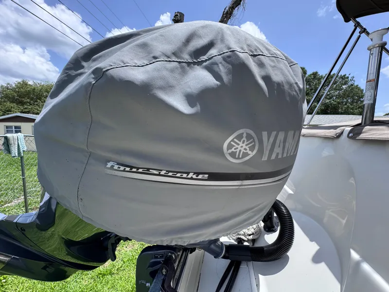 Slide: The Image of Yamaha four-stroke engine cover on 2018 NauticStar DC 243 Sport Deck boat. - 55