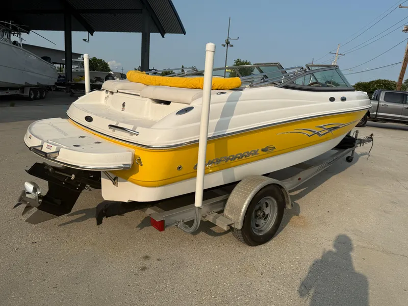 Slide: The Image of 2008 Chaparral SSi 190 boat in yellow and white on a trailer. - 14