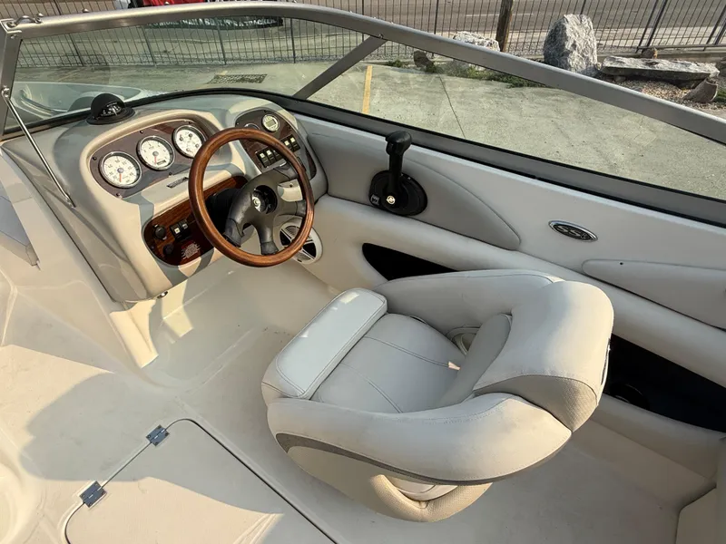 Slide: The Image of 2008 Chaparral SSi 190 boat interior with steering wheel and dashboard. - 19