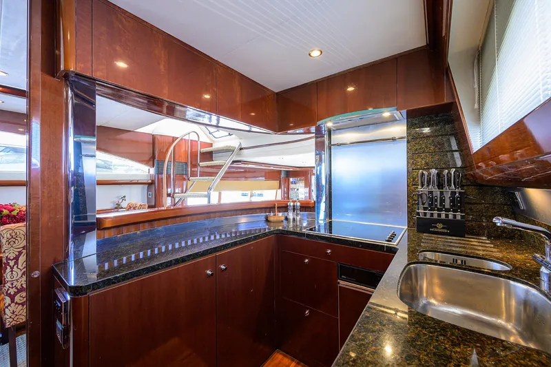 Slide: The Image of Luxurious kitchen interior of 2006 Viking Princess Sport Cruisers yacht with modern amenities. - 19
