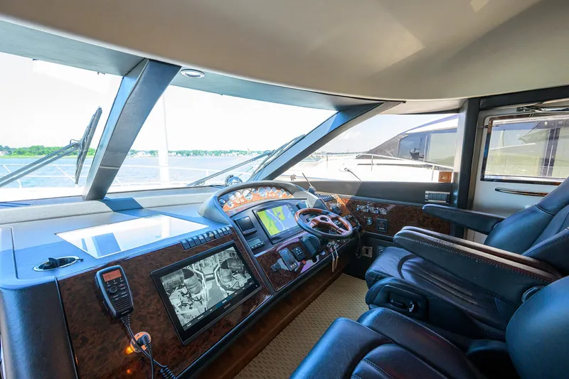 Slide: The Image of Interior cockpit of 2006 Viking Princess Sport Cruisers yacht with modern navigation equipment. - 22