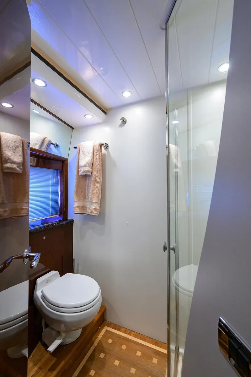 Slide: The Image of Luxurious 2006 Viking Princess Sport Cruisers bathroom with modern fixtures and elegant design. - 27