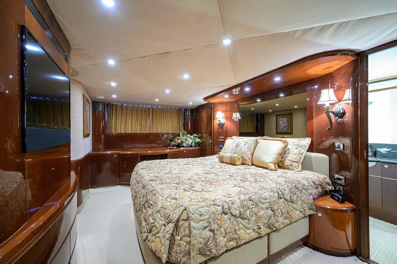 Slide: The Image of Luxurious bedroom interior of 2006 Viking Princess Sport Cruisers yacht with elegant decor and lighting. - 33